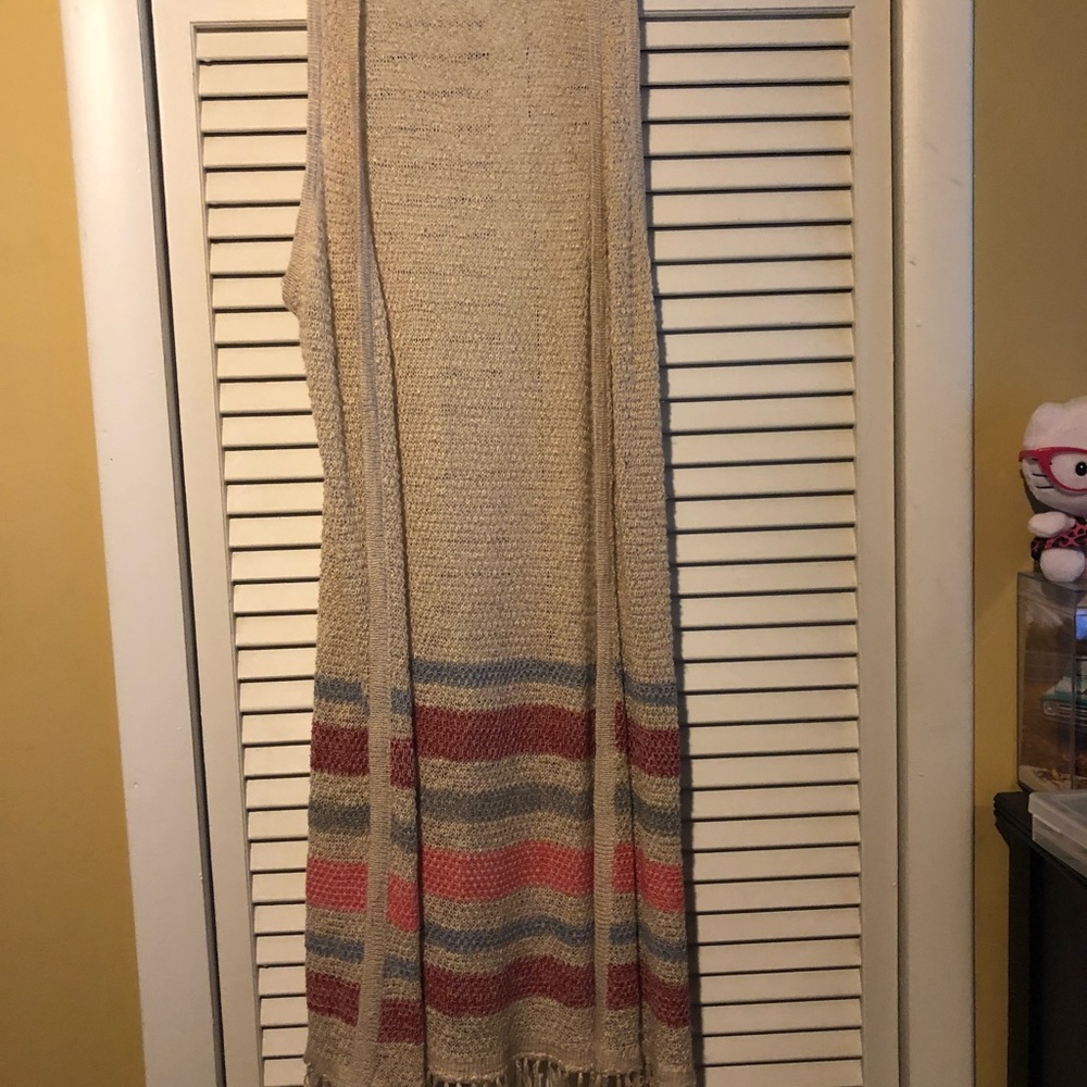Long sleeveless vest